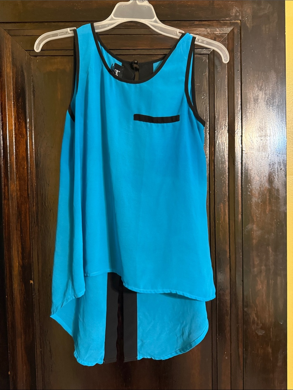 Sleeveless top with slit in back
